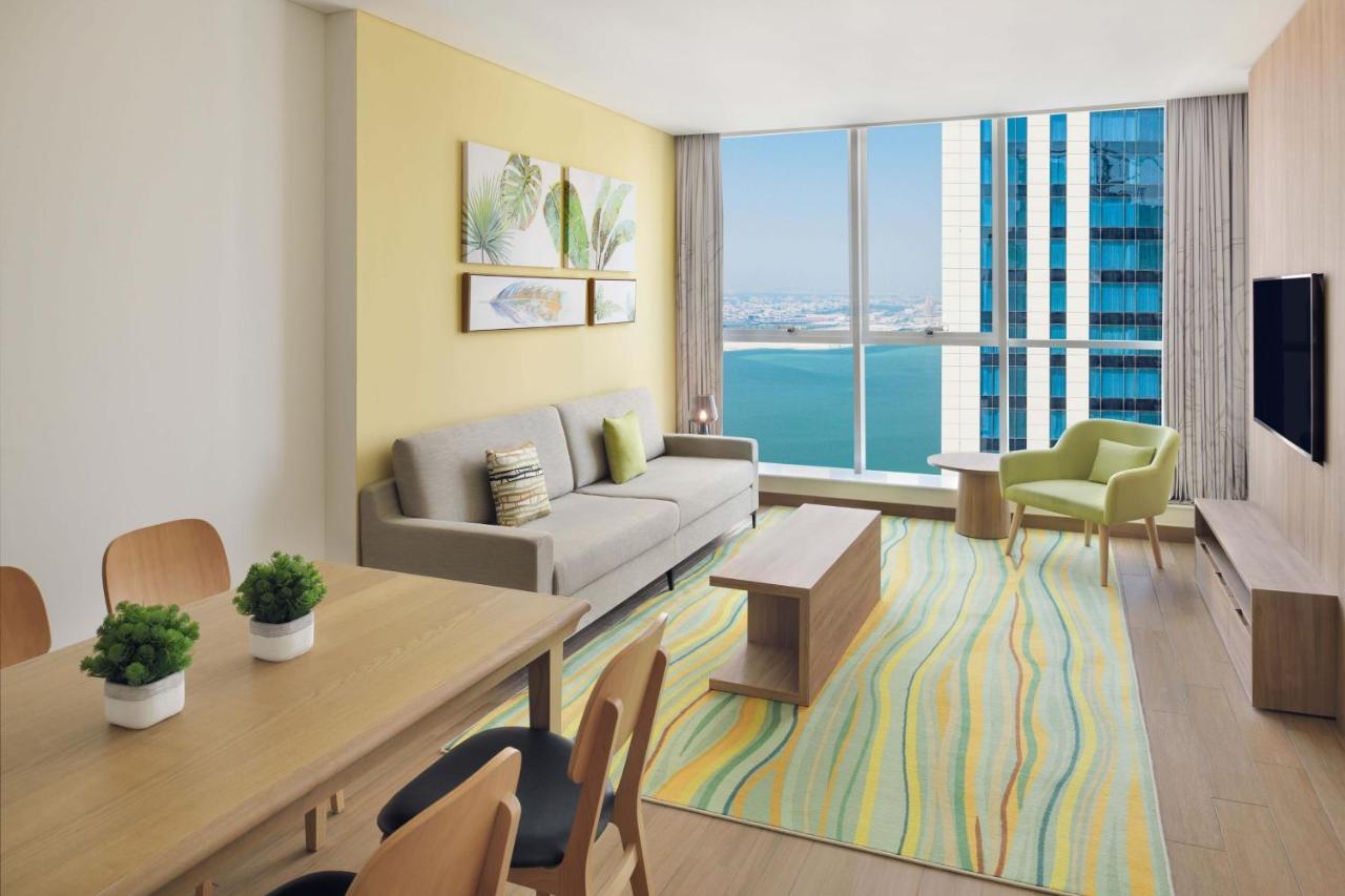 Element By Westin City Center 多哈 外观 照片 A typical living room in a two-bedroom apartment